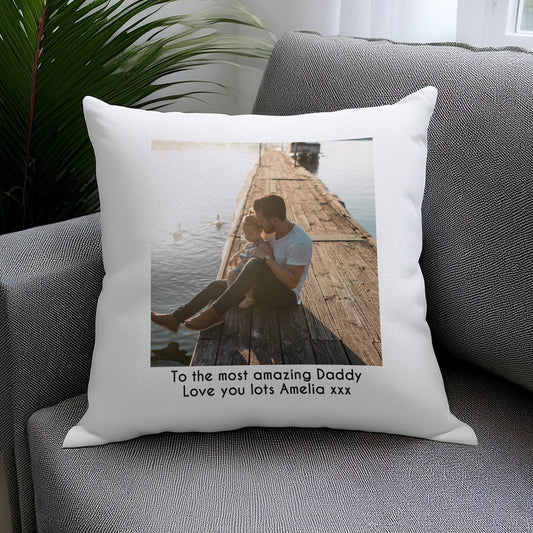 Personalised photo cushion with a family portrait on a sofa