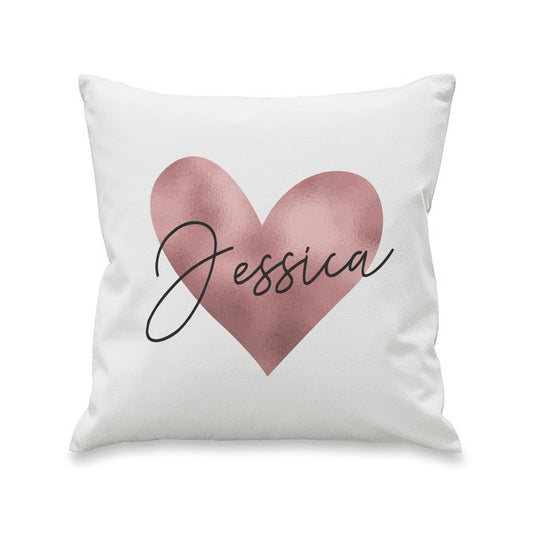 White cushion with a rose-gold heart and black script personalised name