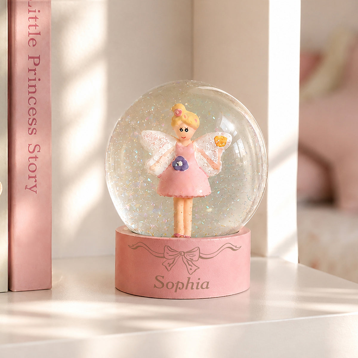 Personalised Bow Fairy Snow Globe from Heartfelt Gifts