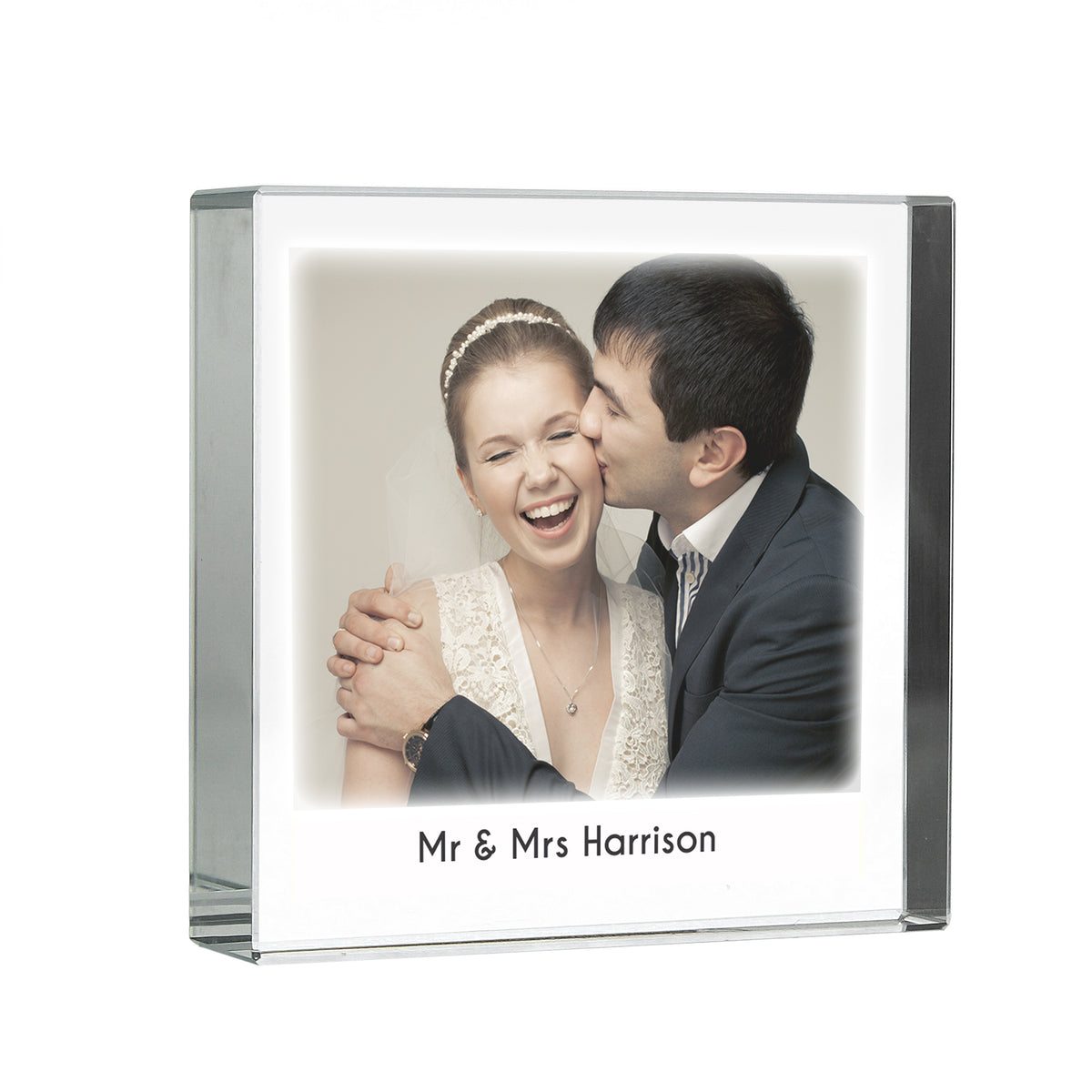 Personalised crystal photo token with a couple’s portrait on white background