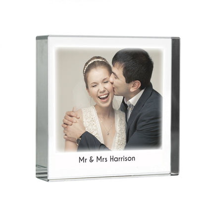 Personalised crystal photo token with a couple’s portrait on white background