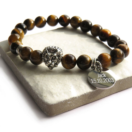 Tiger's eye bead bracelet with a lion-head charm and silver-coloured accents
