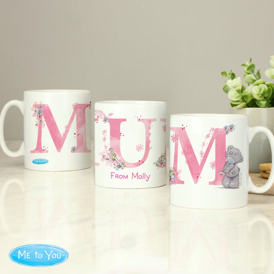 Three views of a personalised Me To You Mum mug with pink floral lettering