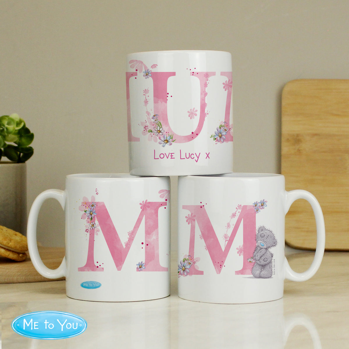 Three views of a personalised Me To You Mum mug with a message