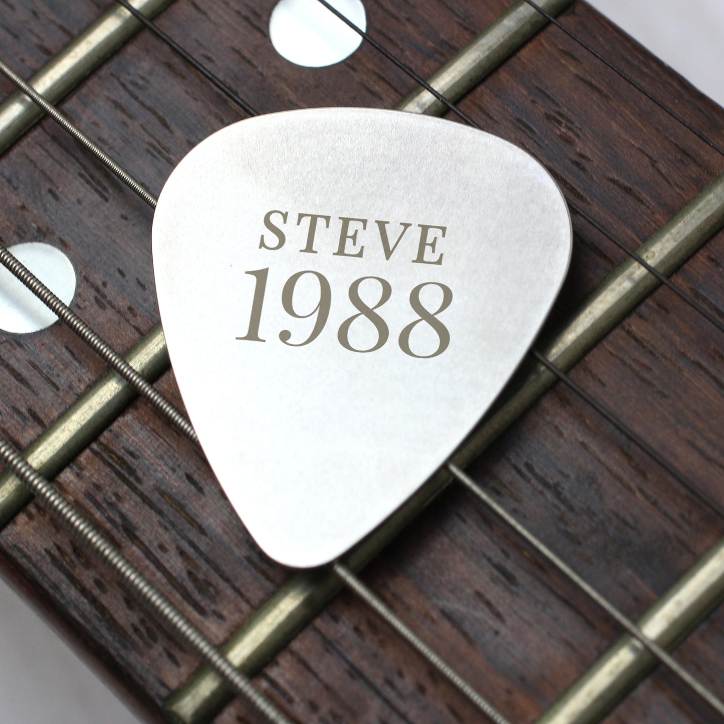 Personalised Year Silver Plectrum from Heartfelt Gifts