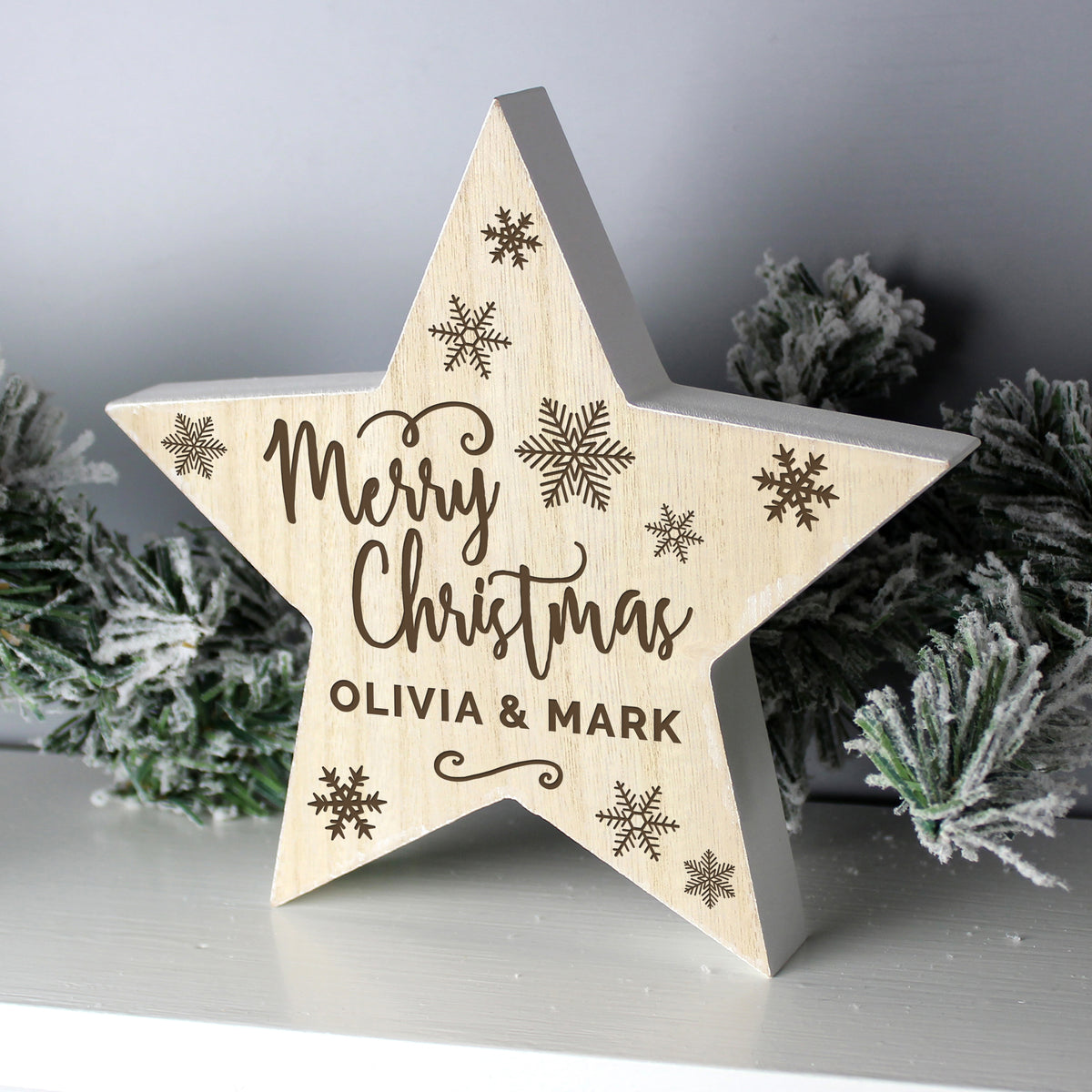 Personalised Merry Christmas Rustic Wooden Star Decoration from Heartfelt Gifts