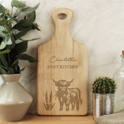 Personalised Highland Cow Paddle Chopping Board from Heartfelt Gifts