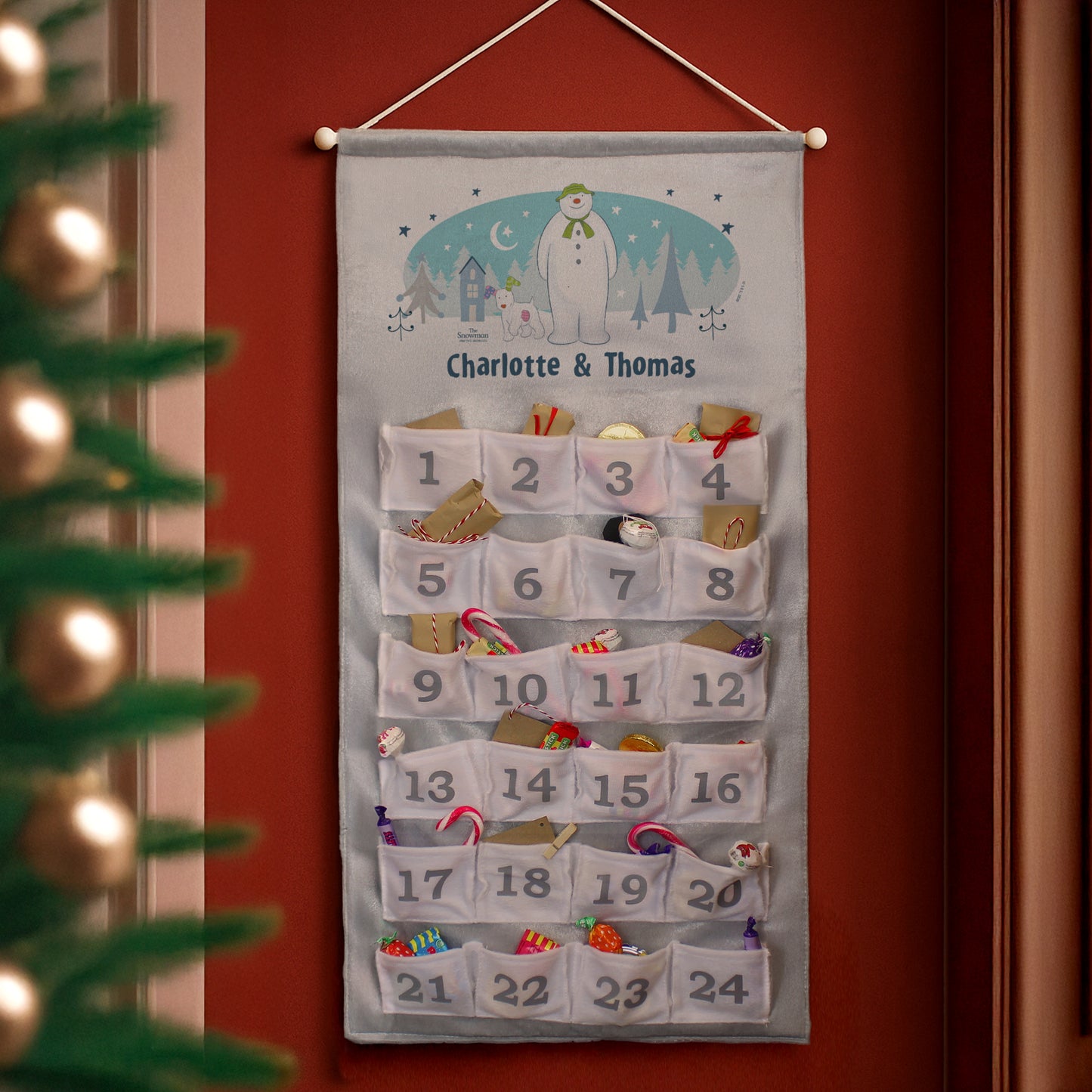 Personalised The Snowman and the Snowdog Advent Calendar In Silver Grey from Heartfelt Gifts