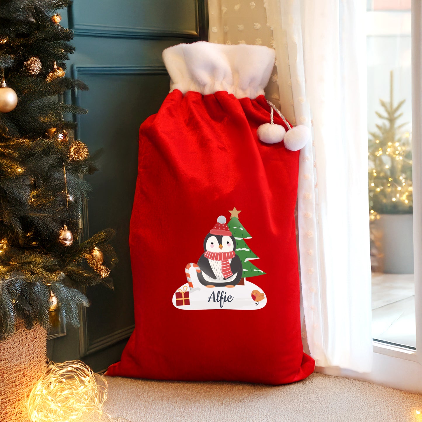 Personalised Christmas Penguin Luxury Pom Pom Red Sack from Heartfelt Gifts
