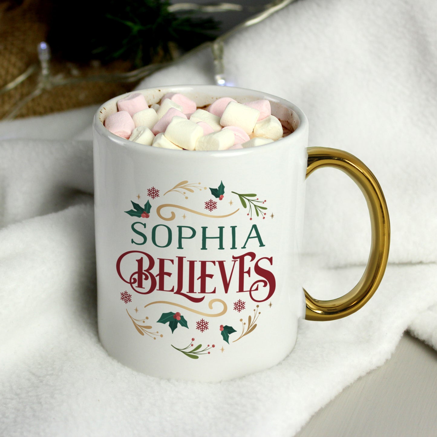 Personalised Believes In Christmas Gold Handled Mug from Heartfelt Gifts