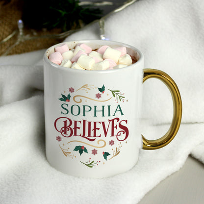 Personalised Believes In Christmas Gold Handled Mug from Heartfelt Gifts
