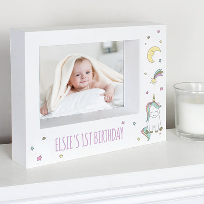 Angled Baby Unicorn box frame showing its deep base and an example first birthday message