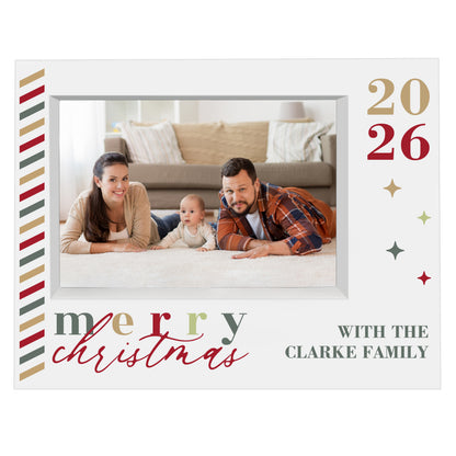 Merry Christmas landscape box frame with a family photograph and Clarke Family example wording on a plain background