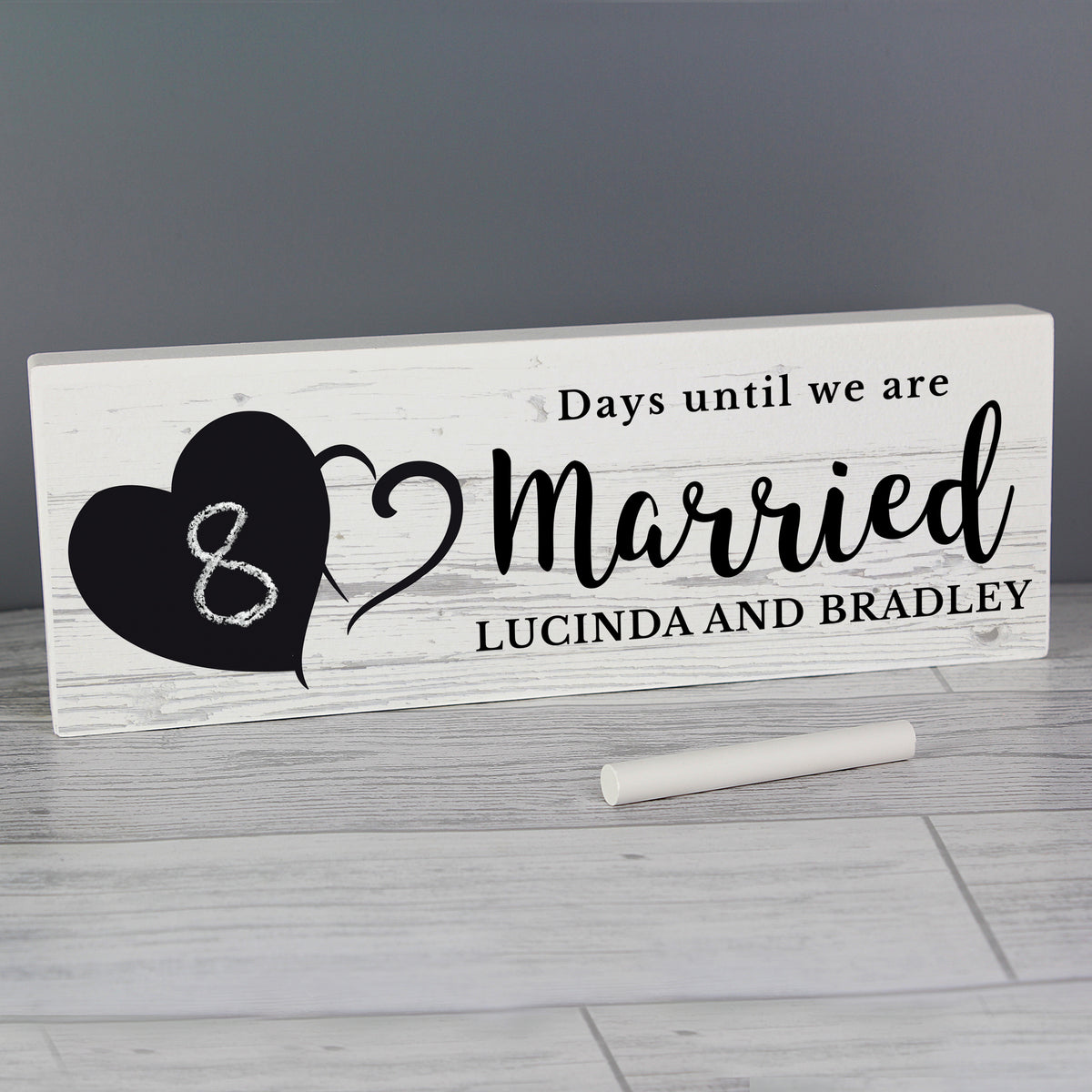 Rustic wooden countdown decoration with chalkboard number area