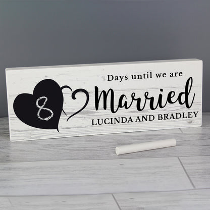 Rustic wooden countdown decoration with chalkboard number area