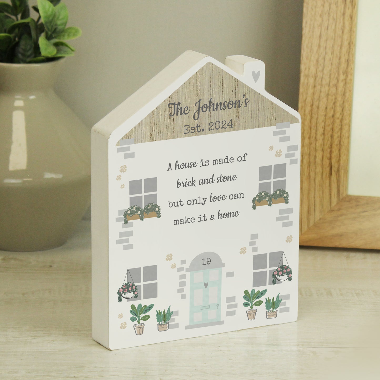 Personalised Love Makes A Home Wooden House Ornament from Heartfelt Gifts