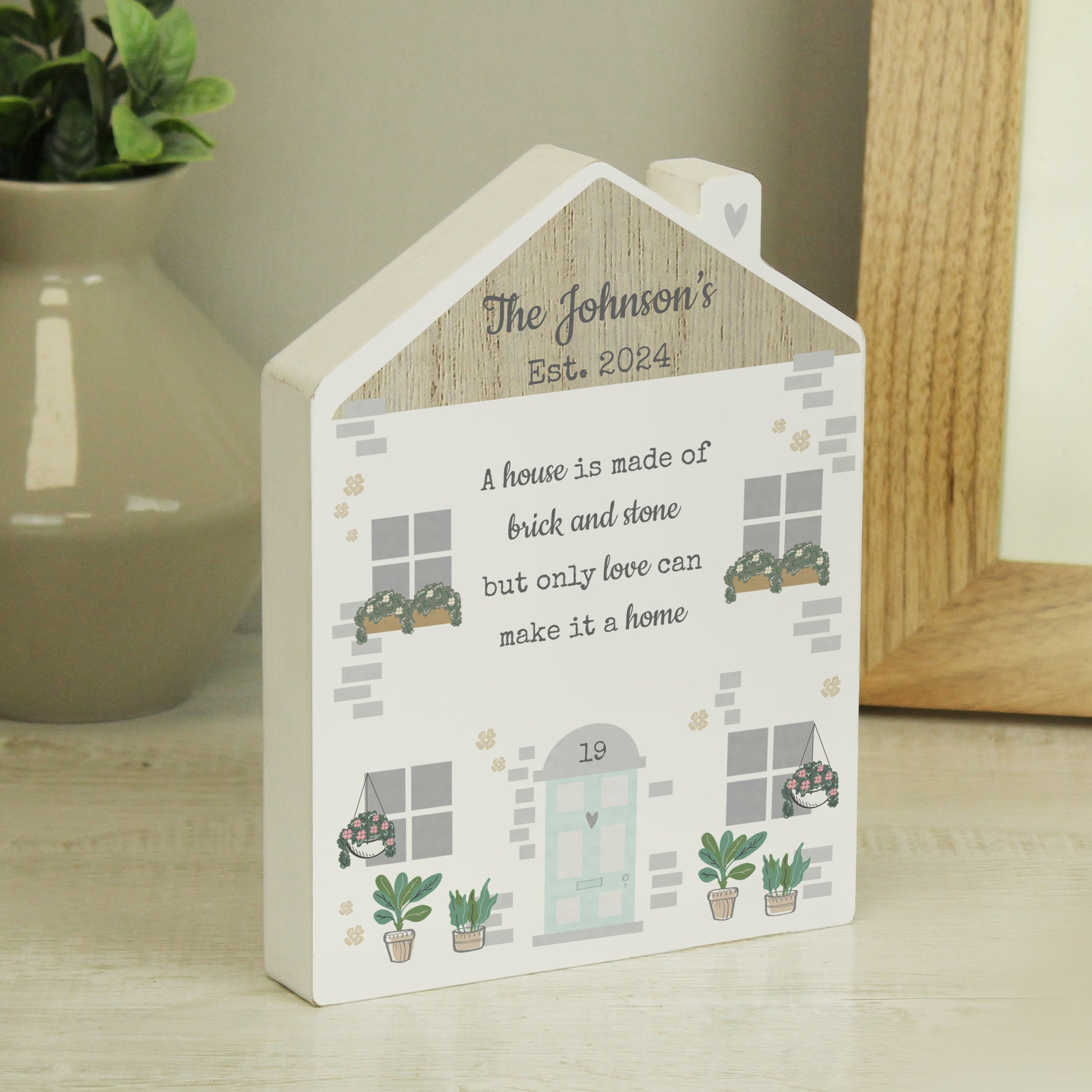 Personalised Love Makes A Home Wooden House Ornament from Heartfelt Gifts
