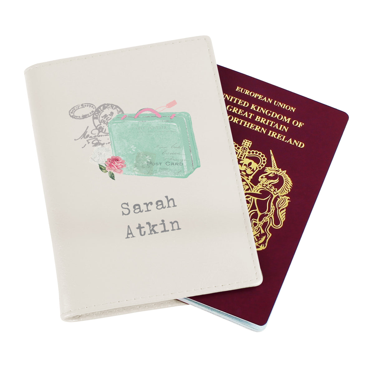 Open cream passport holder with two clear internal pockets