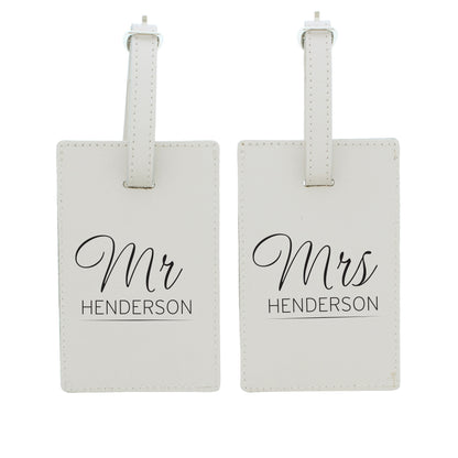 Personalised couples luggage tags showing titles and surnames