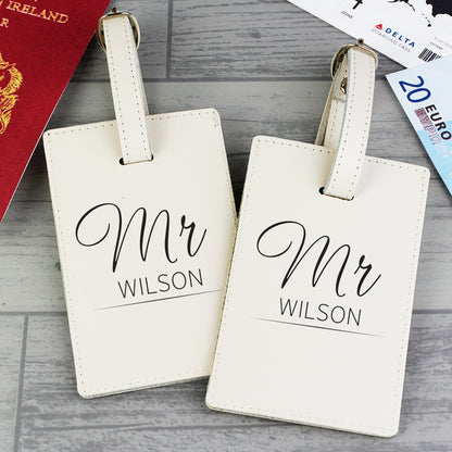 Personalised couples luggage tags presented as a honeymoon gift