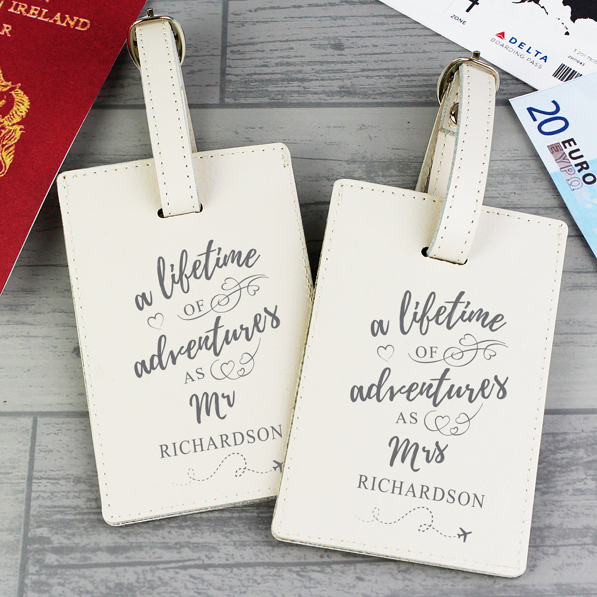 Pair of cream leather Lifetime of Adventures luggage tags for a couple