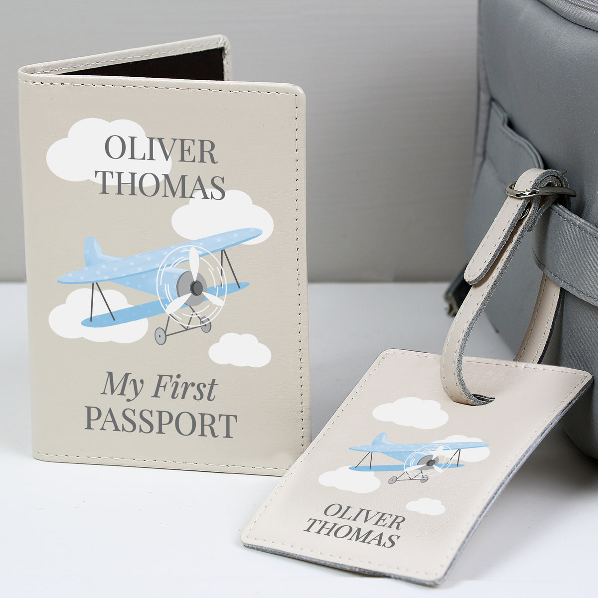 Blue plane passport holder and luggage tag personalised travel set